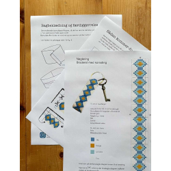 N�glering, broderet med korssting